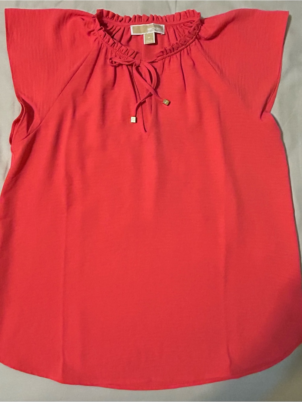 MICHAEL KORS NWOT Bright Coral Ruffle Tie Neck Ladies Cap-Sleeve Blouse Size M.